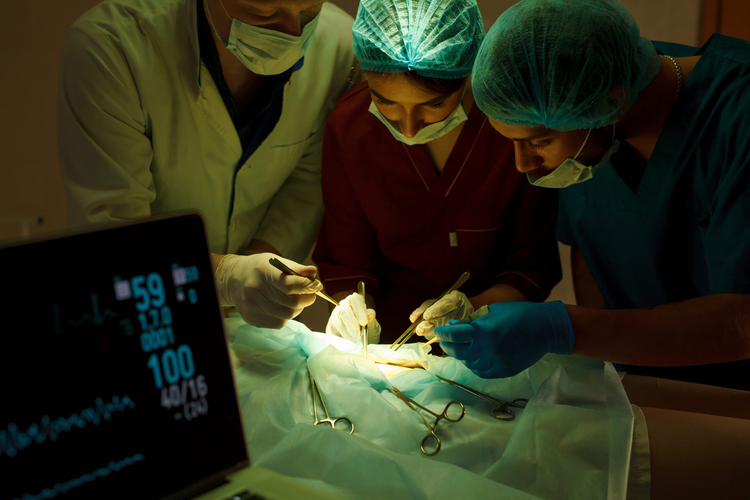 a-group-of-surgeons-doing-operations-in-a-hospital